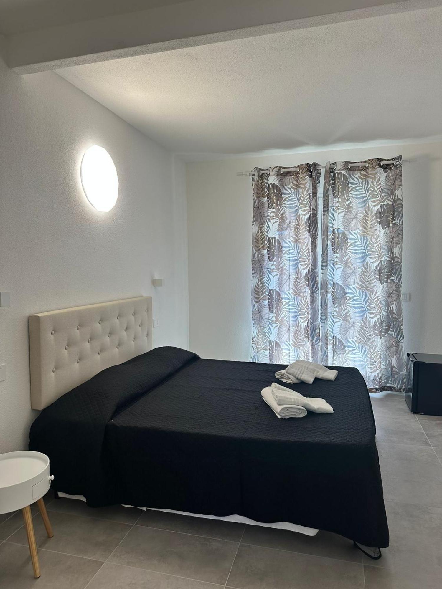 Punto Zero Rooms San Teodoro  Luaran gambar