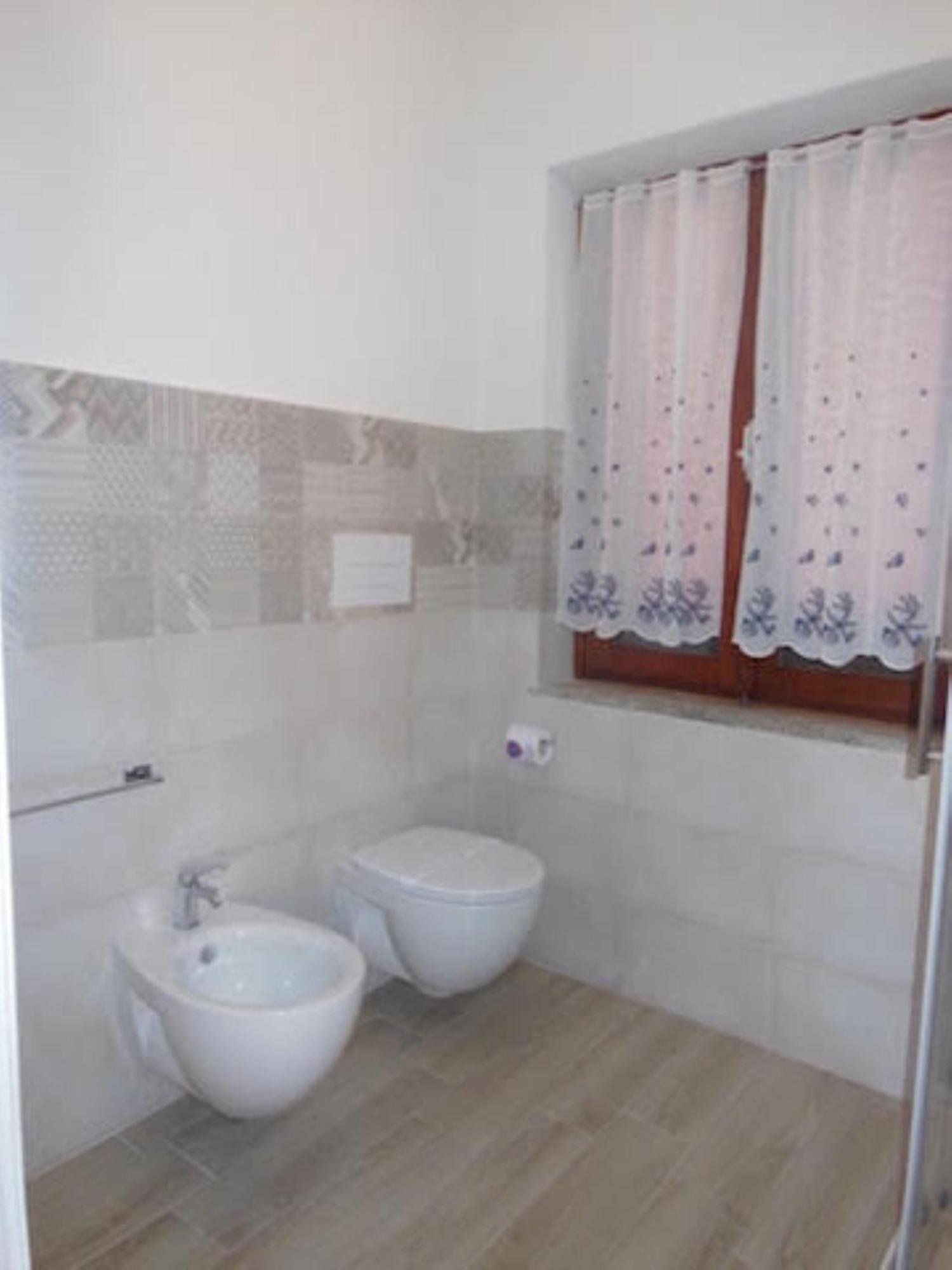 Punto Zero Rooms San Teodoro  Luaran gambar